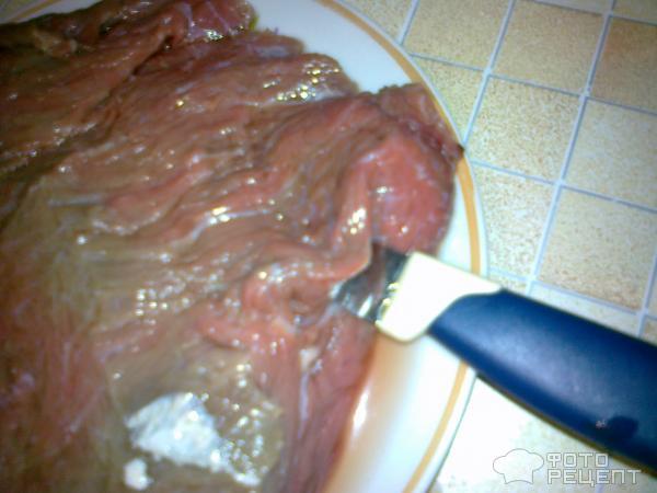 Рецепт Тушеная говядина шпигованная морковью и салом фото
