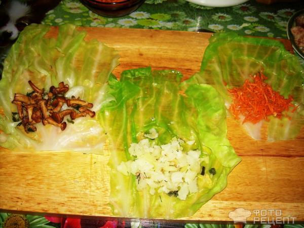 Рецепт Колбаски (или сосиски) в капустных листьях фото