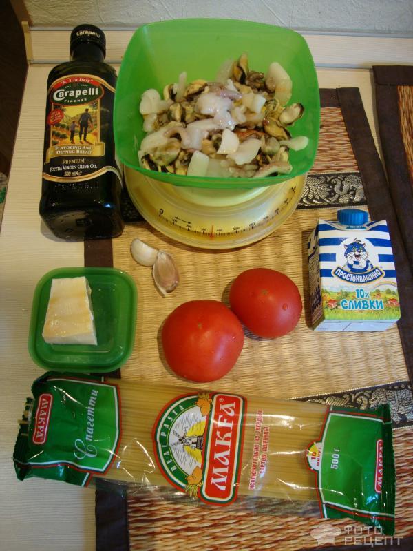 Рецепт Спагетти с морепродуктами в сливочно-томатном соусе фото