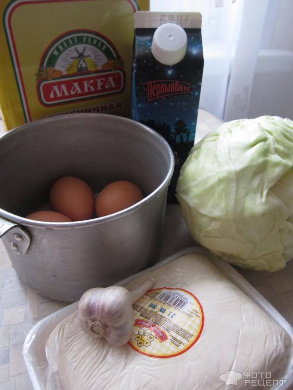 Пирог из слоёного теста с капустой и яйцом — пошаговый рецепт с фото