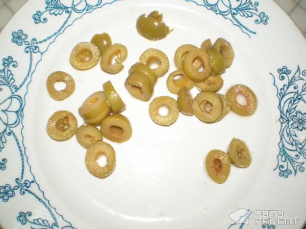 Рецепт Говядина тушеная с оливками фото