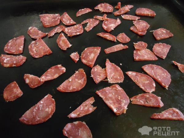 Картофель на шпажках в панировке из чоризо в беконе фото