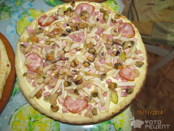 Пицца с морепродуктами фото
