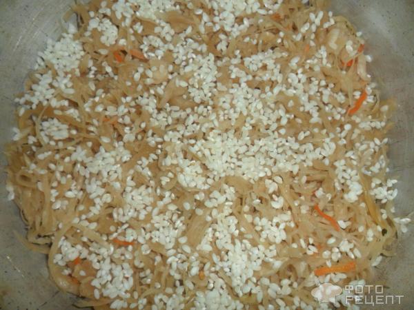 Тушеная квашеная капуста с рисом и бараньими ребрышками фото