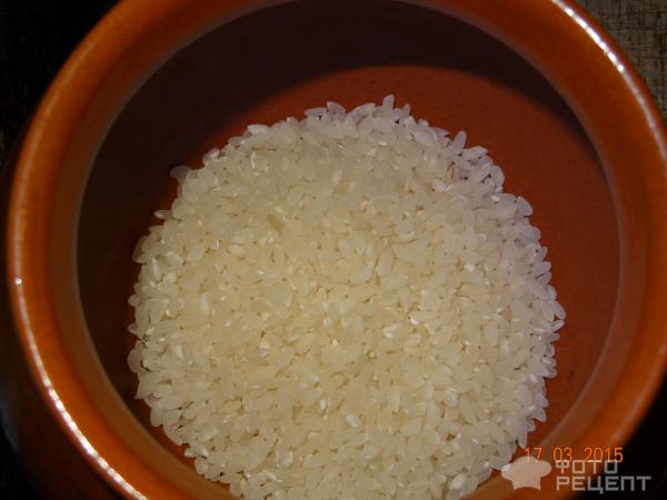 Куриные шеи с рисом в горшочке фото