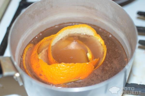 Согревающий напиток из апельсиновой кожуры и корицы фото
