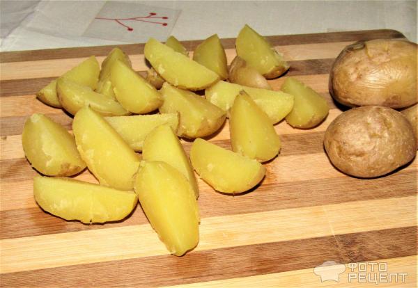 Молодой картофель обжаренный в мундире фото