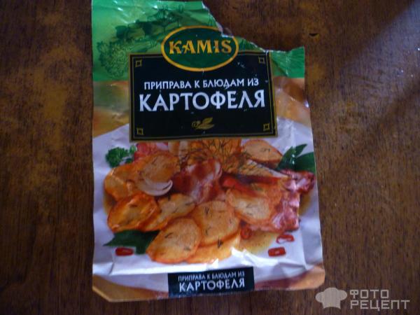 Куриные бедрышки в горшочке фото