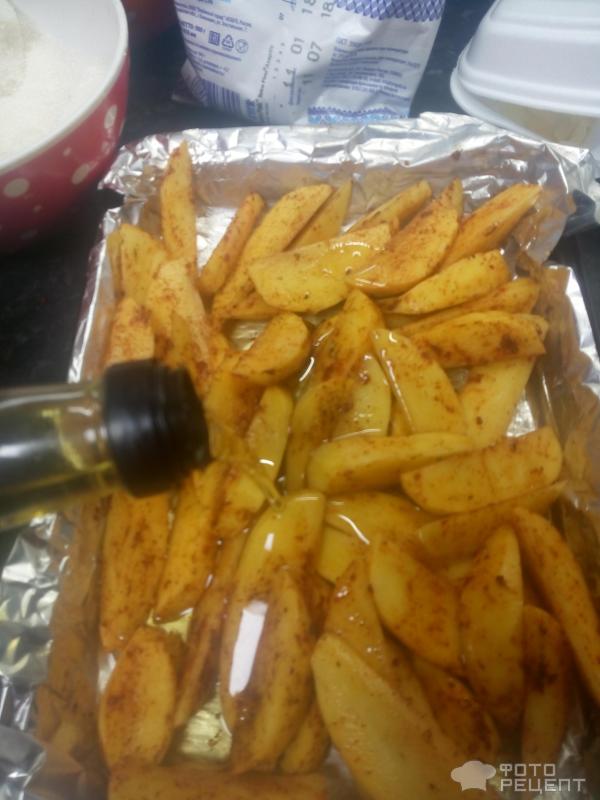 Картофель со специями в духовке фото