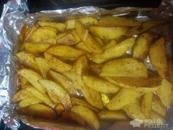 Картофель со специями в духовке фото