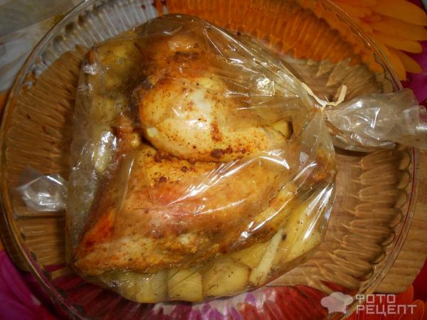 Картошка с куриными бедрами в духовке в рукаве: рецепт с фото