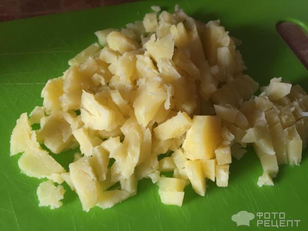 Картофель запеченный в духовке под сыром фото