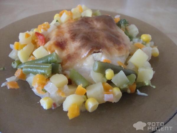 Телапия, запеченая с овощами и сыром в духовке фото