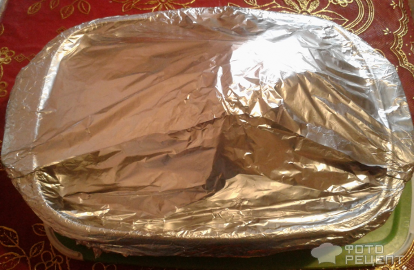 Свиная рулька на овощной подушке в медово-пряном маринаде фото