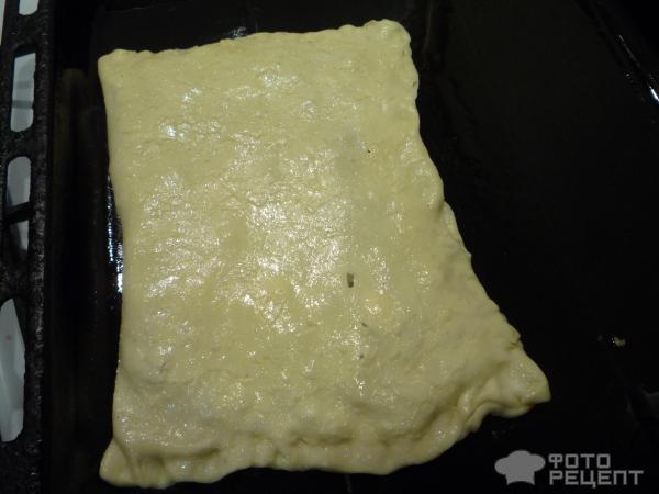 Пирог из слоенного теста с сайрой (консервы) фото