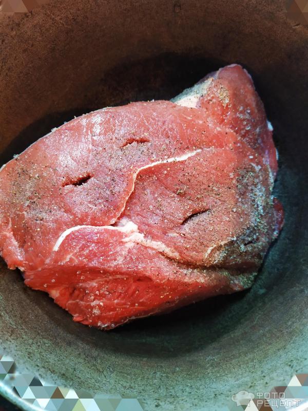 Мясо тушеное с чесноком фото