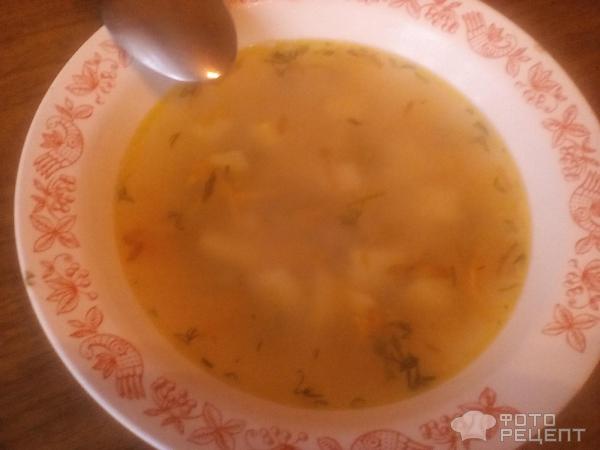 Рисовый суп с зеленым горошком фото