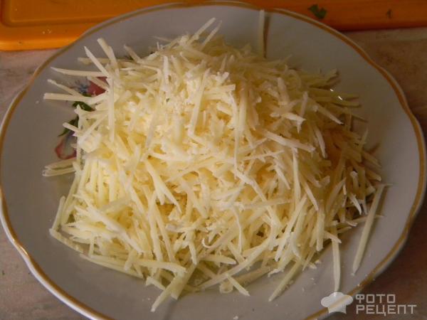 Филе минтая, запеченное в сметанно-сырном соусе фото