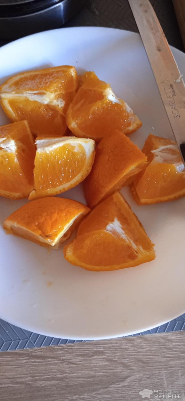 Утка запеченная с тыквой и апельсинами фото