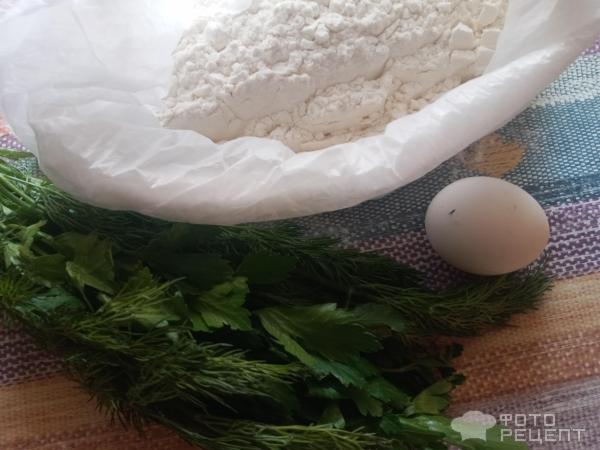 Суп с улитками из теста и зеленью фото