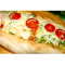 Фото Пицца из лаваша "шоти" с сыром, колбасой и овощами