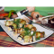 Фото Рулетики из баклажан с творожным сыром и орехами