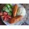Фото Фаршированные кабачки курицей "Лодочки" с овощным соусом