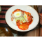 Фото Зразы с целым яйцом, помидором, сыром и соусом