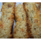Фото Хлеб кукурузно-пшеничный с печеными помидорами и чесноком