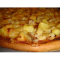 Фото Пицца с курицей и ананасами на слоеном тесте