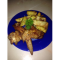 Фото Острые куриные крылышки с картофелем в аэрогриле