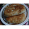 Фото Жаренные пирожки на сковороде с картофелем, капустой