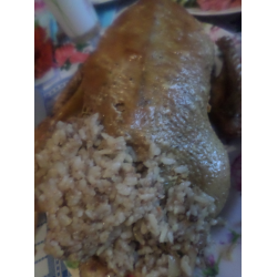 Рецепт: Утка фаршированная рисом и запеченная в духовке