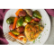 Фото Куриные бедра запеченные с овощами