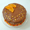 Фото Новогодний шоколадный чизкейк без выпечки с апельсиновой цедрой и шоколадной глазурью