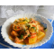 Фото Куриный окорочок с овощами в горшочках